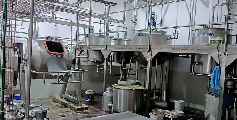 Settling tanks and ghee boiler line